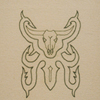 One from The Hero Suite (a suite of 8 pieces); 2001; embroidery in canvas, black leather, silver leaf on cast plastic; this piece 20 ½ x 17 ½ x 2 ¾ inches