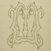 One from The Hero Suite (a suite of 8 pieces); 2001; embroidery in canvas, black leather, silver leaf on cast plastic; this piece 20 ½ x 17 ½ x 2 ¾ inches