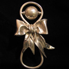 Grace's Rattle; 2006; sterling silver; 5 x 2 ½ x 1 ¼ inches
